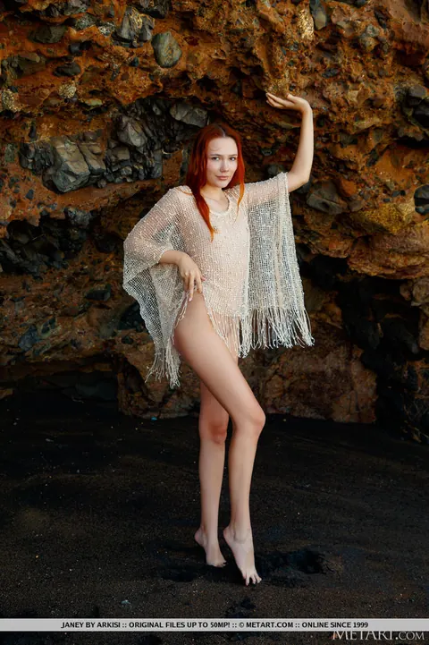 Redhead Strips Naked on Black Sand and Spreads – photo 2 of 18