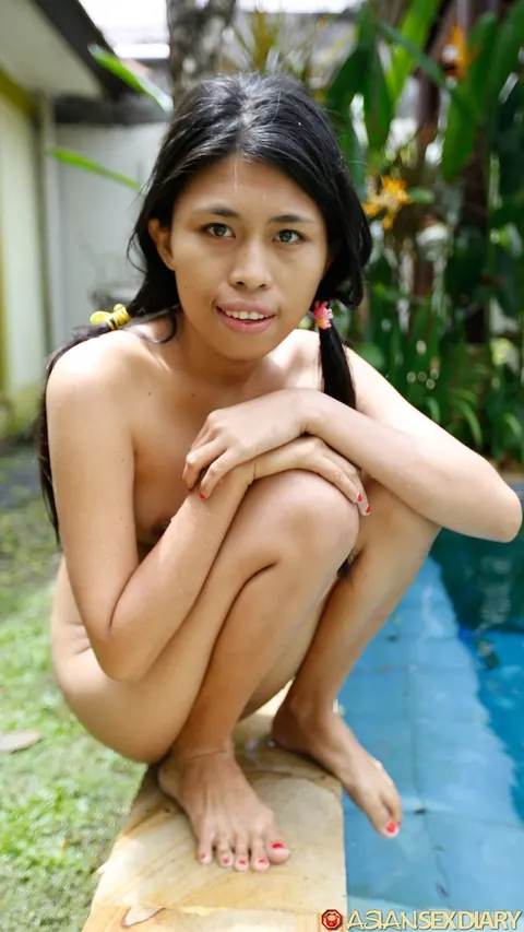 Petite Asian Babe with Pigtails Spreads Her Hairy Pussy Poolside – photo 4 of 20
