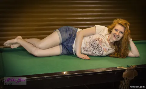 Busty Redhead MILF Strips Out of Her Shorts by the Pool – photo 2 of 16
