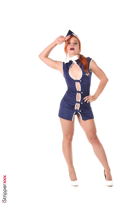 Clemence Audiard: Redheaded Stewardess in Heels Strips and Uses a Dildo – photo 1 of 15