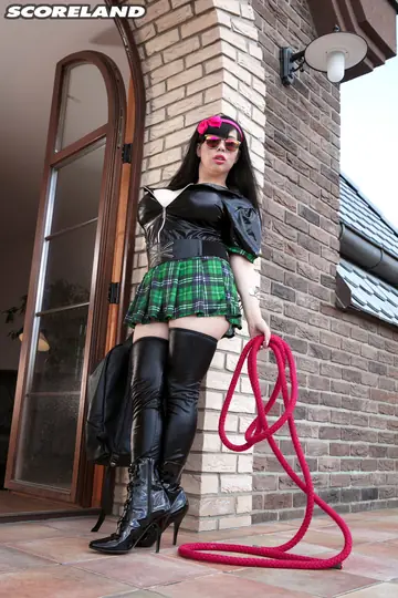 Busty Asian Brunette Spreads Her Pussy in a Uniform Skirt