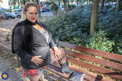 Sophia Lola: Curvy Mature Blonde Reveals Her Big Tits Outdoors – photo 18 of 20