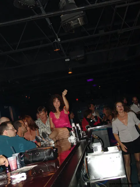 Double Dee: Busty MILF Strips in a Bar for a Threesome on Xmas Eve – photo 20 of 21