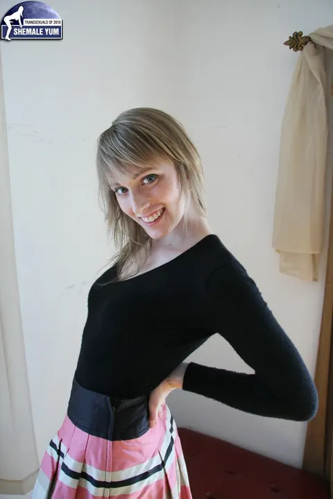 Trans Woman Undresses to Stand Nude and Pose for the Camera – photo 4 of 16