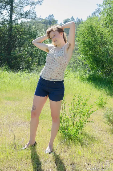 Slim Redhead Strips Nude and Spreads Her Hairy Pussy Outdoors – photo 1 of 20