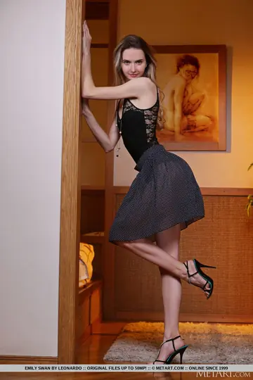 Slim Blonde Strips Out of Her Skirt and Panties on a Chair