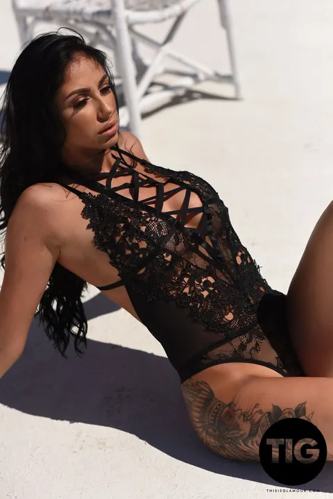 Anya Leigh: British Brunette Shows Off Her Enhanced Tits in a Black Bodysuit Outdoors – photo 6 of 21
