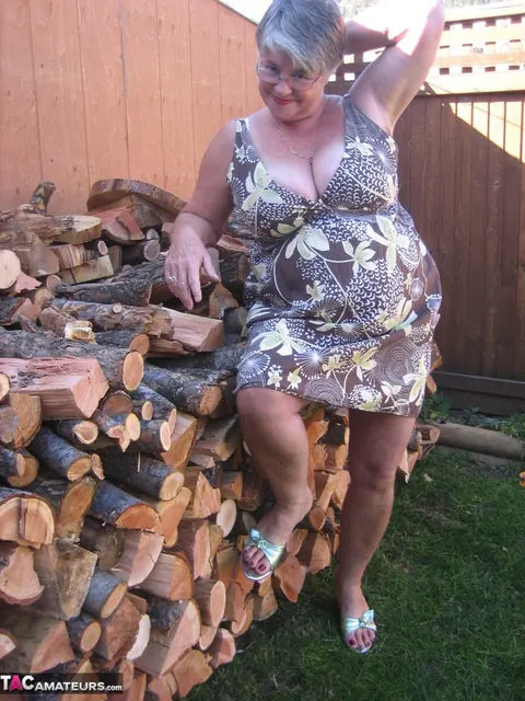 European BBW Strips by a Wood Pile Outdoors – photo 3 of 20