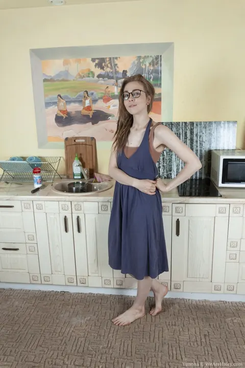 Hairy Woman in Lingerie and Glasses Spreads in the Kitchen – photo 1 of 16