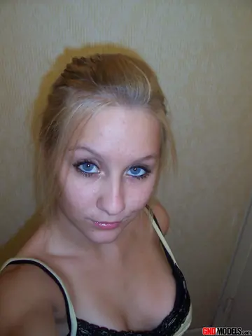 Blonde Strips Out of Her Lingerie for a Mirror Selfie