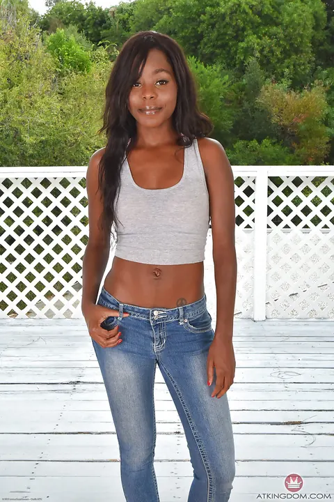 Ebony MILF Pulls Jeans Aside to Spread Her Shaved Pussy Outdoors – photo 1 of 16
