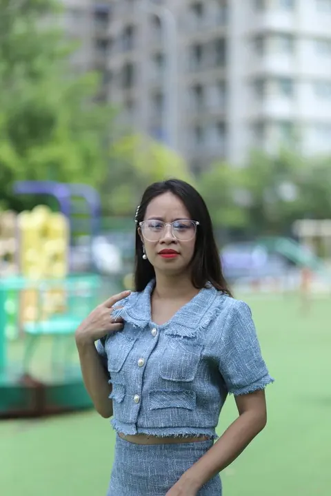 Petite Asian Woman in Glasses Poses Outdoors – photo 11 of 21