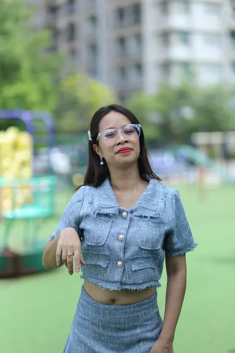 Petite Asian Woman in Glasses Poses Outdoors – photo 18 of 21
