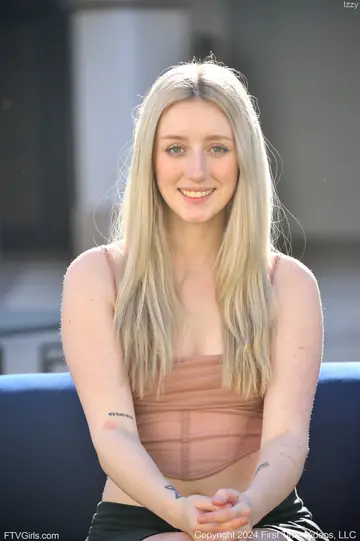 Woman Lifts Her Skirt and Fucks a Dildo on an Outdoor Sofa