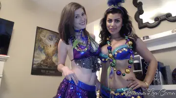 Busty Brunette MILF Strips Out of Her Costume for Lesbian Sex