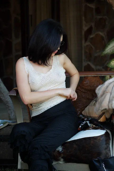 Black-Haired Babe in Glasses and Boots Spreads Her Shaved Pussy – photo 6 of 20