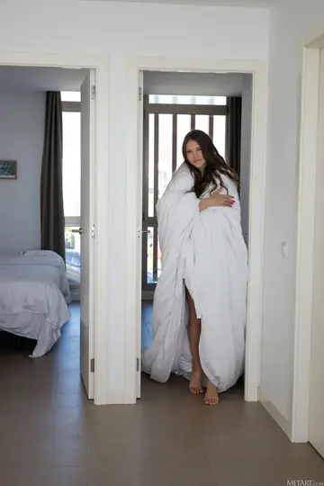 Brunette with Small Natural Tits Undresses and Bares Her Ass