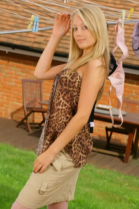 Blonde in Stockings Shows Off Her Natural Tits Outdoors – photo 1 of 21
