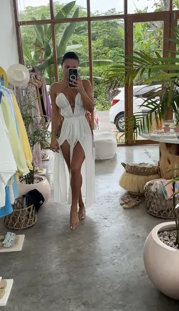 Busty Russian Woman Poses in a Bikini and Skirt for Mirror Selfies