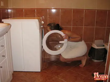 Slim European Brunette Strips and Fucks on the Toilet