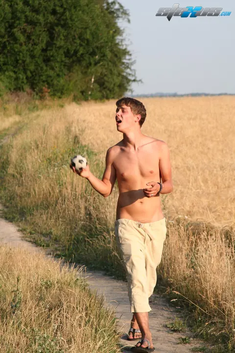 Brunette Guy Pulls Down His Shorts Outdoors – photo 18 of 20