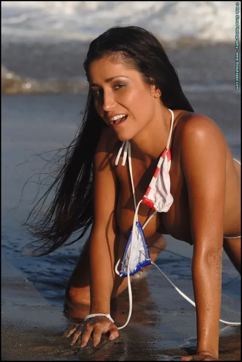 Brunette MILF with Big Tits Strips Out of Her Bikini on the Beach – photo 9 of 15
