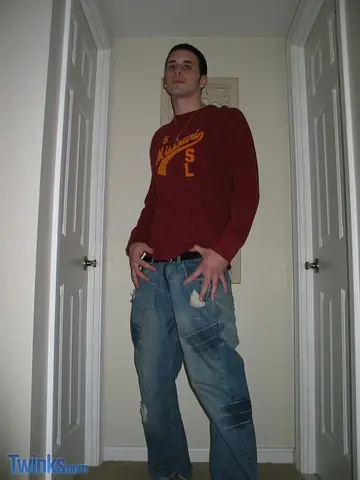 Shaved-Headed Guy Strips Naked and Strokes His Cock in the Hallway