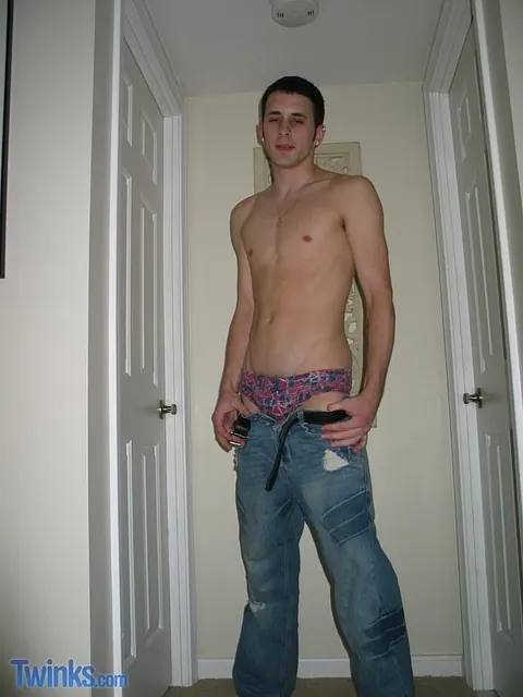 Shaved-Headed Guy Strips Naked and Strokes His Cock in the Hallway – photo 4 of 21