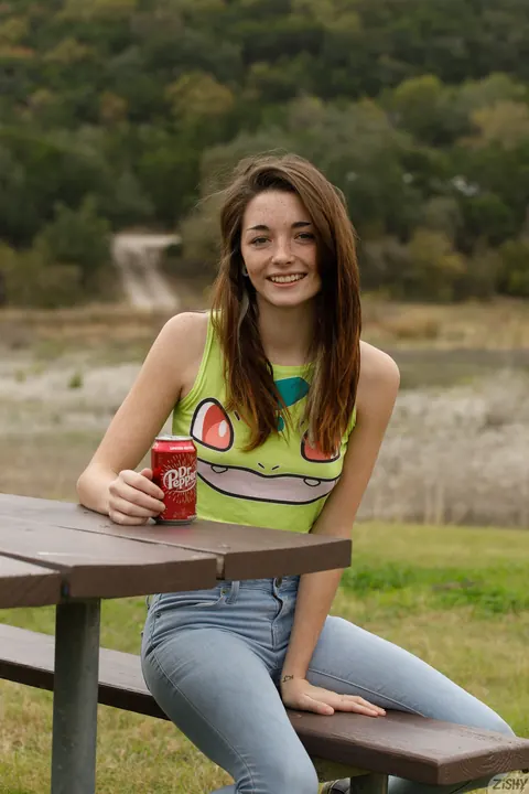 Hannah Tarley: Slim Brunette Shows Her Ass and Small Natural Tits in Jeans Outdoors – photo 2 of 12