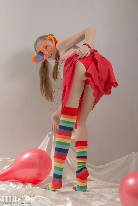 Slim Woman in Rainbow Socks Spreads Her Hairy Pussy – photo 3 of 20