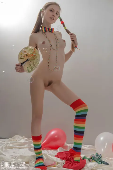 Slim Woman in Rainbow Socks Spreads Her Hairy Pussy – photo 16 of 20