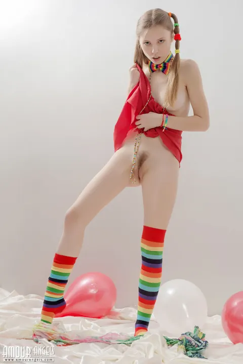 Slim Woman in Rainbow Socks Spreads Her Hairy Pussy – photo 13 of 20