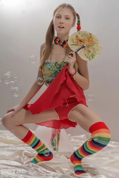 Slim Woman in Rainbow Socks Spreads Her Hairy Pussy – photo 6 of 20