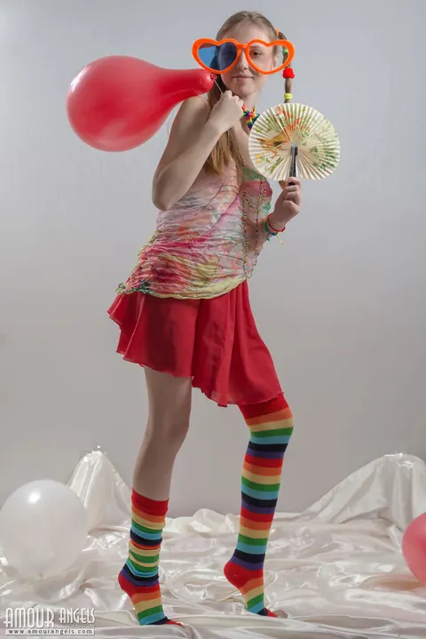 Slim Woman in Rainbow Socks Spreads Her Hairy Pussy – photo 1 of 20