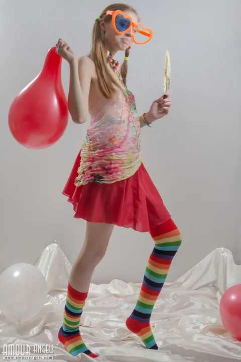 Slim Woman in Rainbow Socks Spreads Her Hairy Pussy – photo 2 of 20