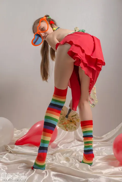Slim Woman in Rainbow Socks Spreads Her Hairy Pussy – photo 4 of 20