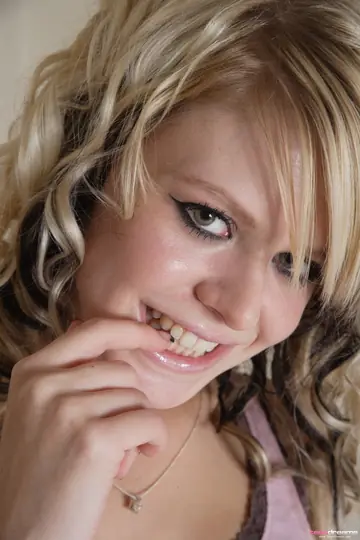 Petite Curly Blonde Spreads Her Legs and Uses a Dildo