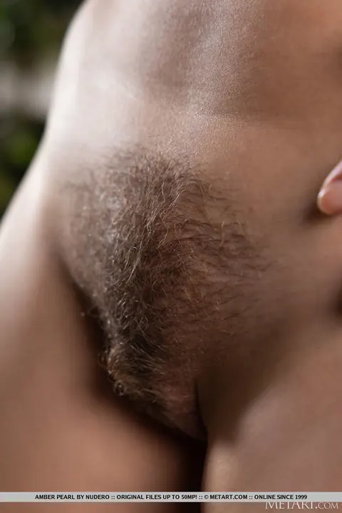 Amber Pearl: Thick Brunette Spreads Her Hairy Pussy Among Flowers – photo 3 of 18