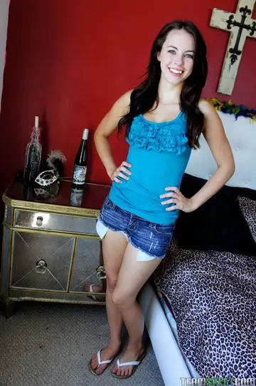 Skinny Brunette Strips and Reveals Her Tattooed Body