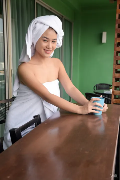 Kahlisa Boonyasak: Asian Brunette Oils Her Natural Tits and Hairy Pussy in the Kitchen – photo 1 of 20