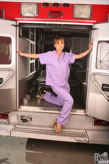Slim Asian Nurse in Lingerie Spreads Her Pussy in an Ambulance