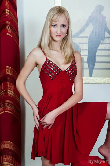 Zemira – Blonde European Strips Out of Her Red Dress to Show Her Big Tits