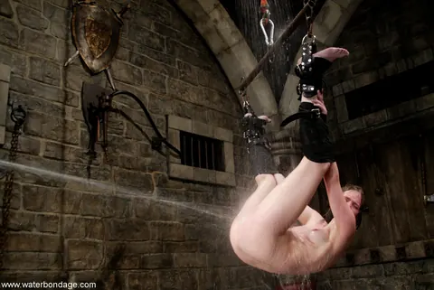 Blonde Woman Bound in Bondage Restraints – photo 9 of 21