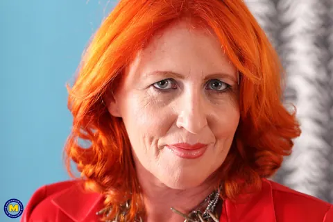 Redhead MILF Toys Her Trimmed Pussy in Stockings – photo 1 of 21