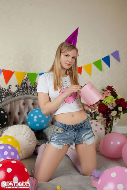 Blonde in Shorts and Socks Strips and Spreads on Her Birthday – photo 5 of 20