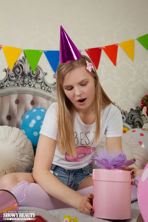 Blonde in Shorts and Socks Strips and Spreads on Her Birthday – photo 4 of 20