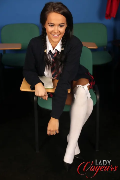 Felicity Hill: Amateur Brunette in Uniform Flashes Yellow Panties and Stockings – photo 5 of 21
