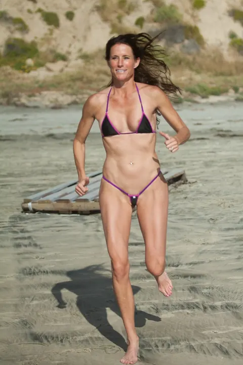 Sofie Marie: Tall Brunette MILF Poses on the Beach in a Bikini – photo 10 of 20