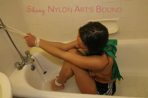 Brunette Bound in Shorts Spreads in the Bathroom – photo 8 of 16