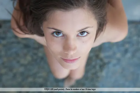 Czech Brunette with a Tattoo Wades Naked in a Courtyard Pool – photo 14 of 16